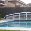 L'abri bas arrondi sur rails de POOL COVER