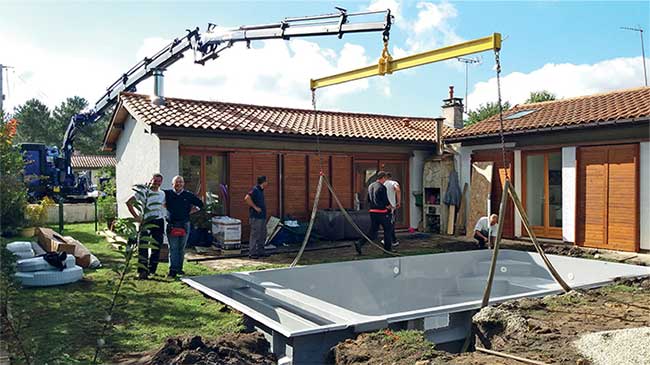 livraison grue pose piscine coque aboral