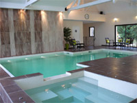 piscine intÃ©rieure avec spa attenant Concept & Creation